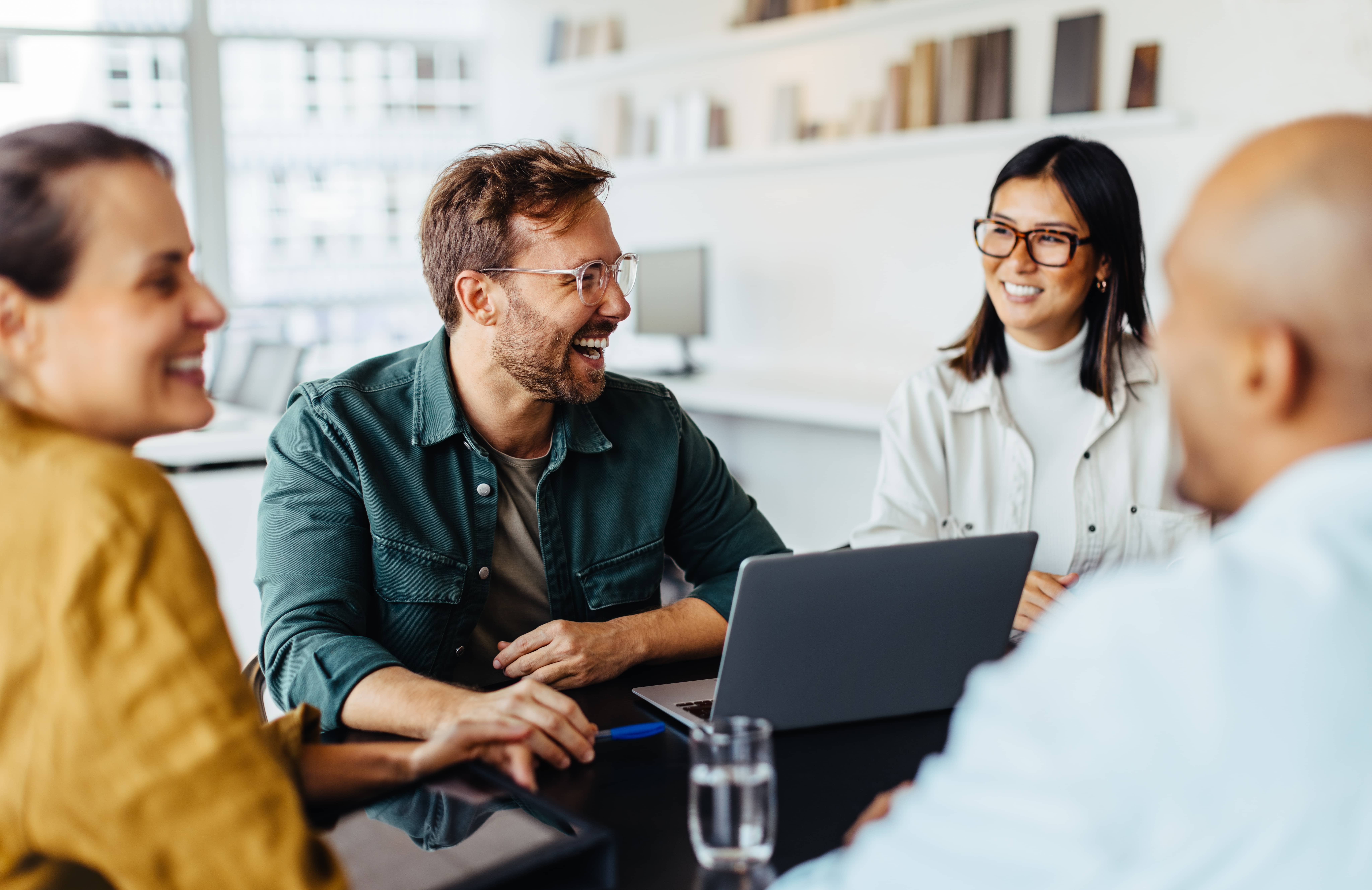 stock-photo-diverse-business-people-having-a-team-meeting-in-an-office-group-of-happy-business-professionals-2360064203